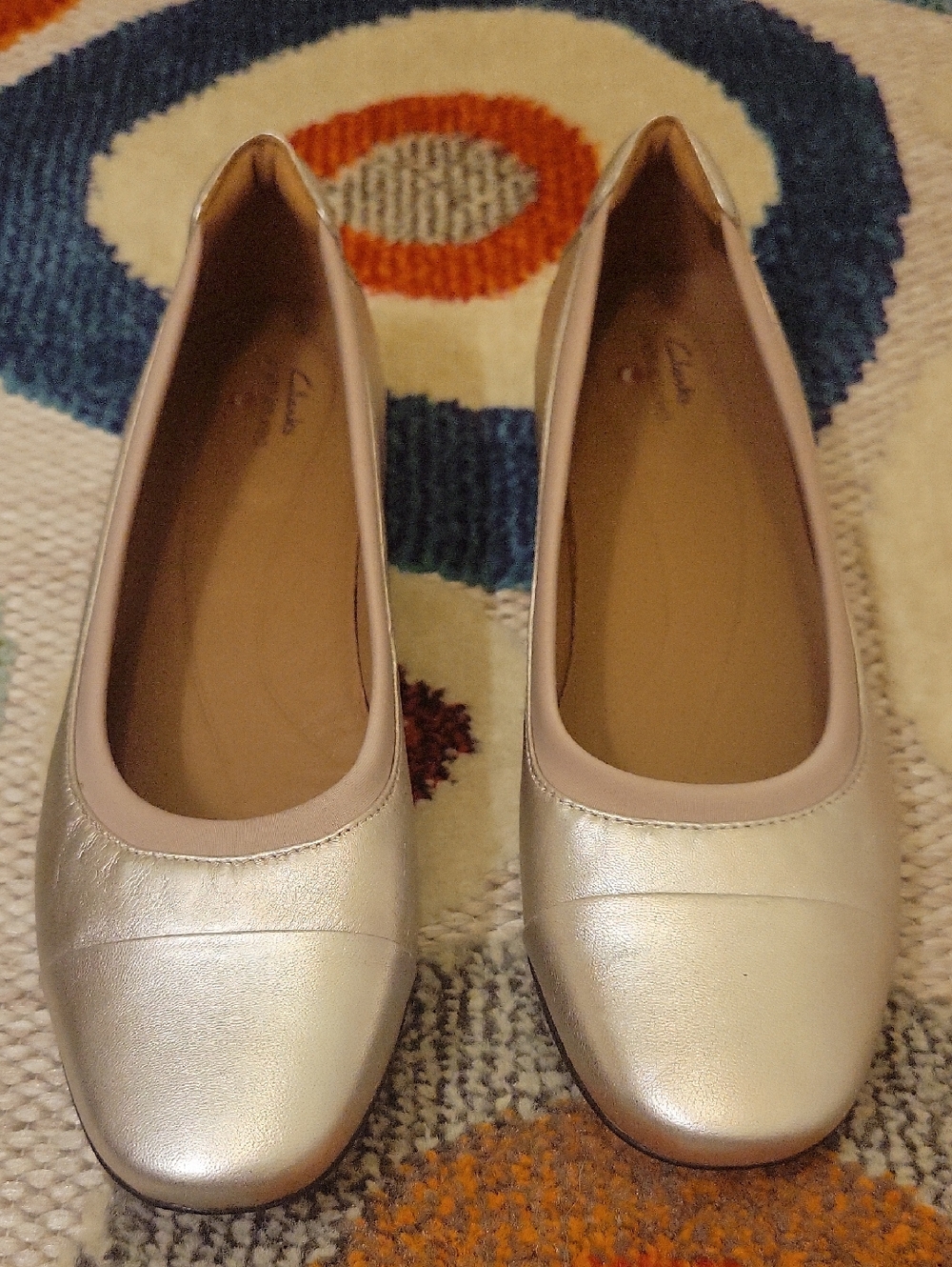 Clarks Women’s Shimmery Silver Ballet Flats